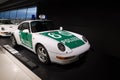 vintage white and green police sports car Porsche 911 Carrera, Oldtimer car collection, retro-style, nostalgia and automotive