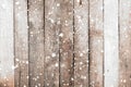 Vintage white wood wall with snow falling over. Royalty Free Stock Photo