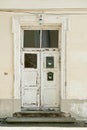 Vintage white wooden door with mailbox and lantern Royalty Free Stock Photo