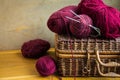 Vintage Wicker Basket Bolls Clews Of Red Wool Yarn, Needles On Wood Table, Knitting, Crafts, Hobby