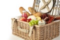 Vintage wicker picnic hamper filled with food