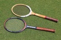 Vintage Wilson and Donnay tennis rackets on the grass tennis court