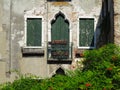 Vintage window and detail of a classical building in the historical center of Venezia. Royalty Free Stock Photo