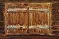 Vintage Window of old alpine hut. Wooden rustic background Royalty Free Stock Photo