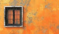 Vintage window on orange cement wall Royalty Free Stock Photo