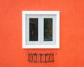 Vintage window on orange cement wall Royalty Free Stock Photo