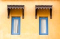 Vintage window on yellow cement wall Royalty Free Stock Photo