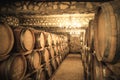 Vintage winery cellar with wine barrels Royalty Free Stock Photo