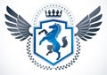 Vintage winged emblem created in vector heraldic design and comp