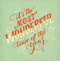 Vintage winter postcard. It is the most wonderful time of the year inscription. Retro lettering with script words and