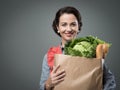 Vintage woman with grocery bag Royalty Free Stock Photo