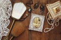 Vintage woman toilet objects next to old photography