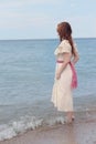 Vintage woman wadding in the sea Royalty Free Stock Photo