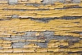 Vintage wood background with yellow peeling paint Royalty Free Stock Photo