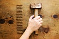 Vintage wood table with hammer and nails. Royalty Free Stock Photo