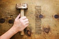 Vintage wood table with hammer and nails. Royalty Free Stock Photo