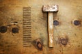 Vintage wood table with hammer and nails Royalty Free Stock Photo