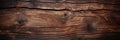 Vintage wood texture, old dark brown cracked plank. Weathered long wooden board with natural pattern and color. Theme of