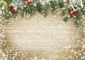 Vintage wood texture with snow, holly and firtree