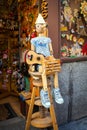 Vintage wood toy shop with Pinocchio dool exposed on front in Ma