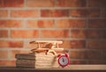 Vintage wooden airplane toy and old books Royalty Free Stock Photo