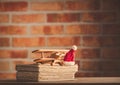 Vintage wooden airplane toy and old books Royalty Free Stock Photo