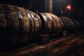 Vintage wooden barrels in dark wine cellar of medieval winery. Old oak casks with rum in underground storage. Concept of vineyard Royalty Free Stock Photo