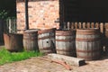 Vintage wooden barrels, left outside in an old yard.