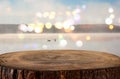 vintage wooden board table in front of abstract photo of misty and foggy lake at morning/evening. Royalty Free Stock Photo