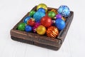 Vintage wooden box with colored bright Christmas tree balls Royalty Free Stock Photo