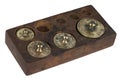 Vintage wooden box with scale weights set on white Royalty Free Stock Photo