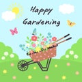 Vintage wooden cart with flowers on the meadow. Sunny landscape with floral wheelbarrow and butterflies. Happy gardening text