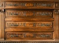 Vintage wooden chest of drawers with carved detail