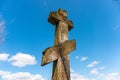 Vintage wooden christian orthodox cross on blue sky background Royalty Free Stock Photo
