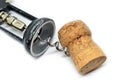 Vintage wooden corkscrew bottle opener and red wine cork Royalty Free Stock Photo