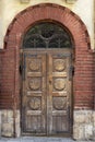 Vintage wooden door of brown color. Beautiful front door in an old city.