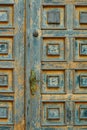 Vintage wooden door and old white wall as background Royalty Free Stock Photo
