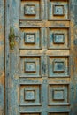 Vintage wooden door and old white wall as background Royalty Free Stock Photo