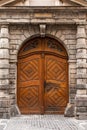 Vintage wooden door, stone house. Old Europe