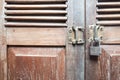Vintage wooden door texture background with old steel lock is lo Royalty Free Stock Photo
