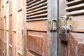 Vintage wooden door texture background with old steel lock is lo Royalty Free Stock Photo