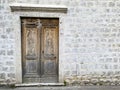 Vintage wooden door on white brick wall Royalty Free Stock Photo