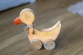 Vintage wooden duck toy on wheels Royalty Free Stock Photo