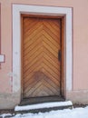 Vintage wooden house door on winter street, selective focus Royalty Free Stock Photo