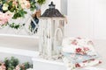 Vintage wooden lantern on classic white terrace. Royalty Free Stock Photo