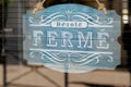 Vintage wooden panel shop sign desole c`est ferme french text means sorry we are closed board