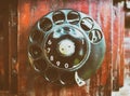 Vintage wooden phone with dial pad Royalty Free Stock Photo