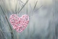 Vintage wooden pink heart over blurred garden background Royalty Free Stock Photo