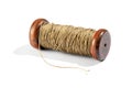 Vintage wooden reel with twine on white