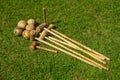 Vintage wooden set for a game of croquet on green grass Royalty Free Stock Photo